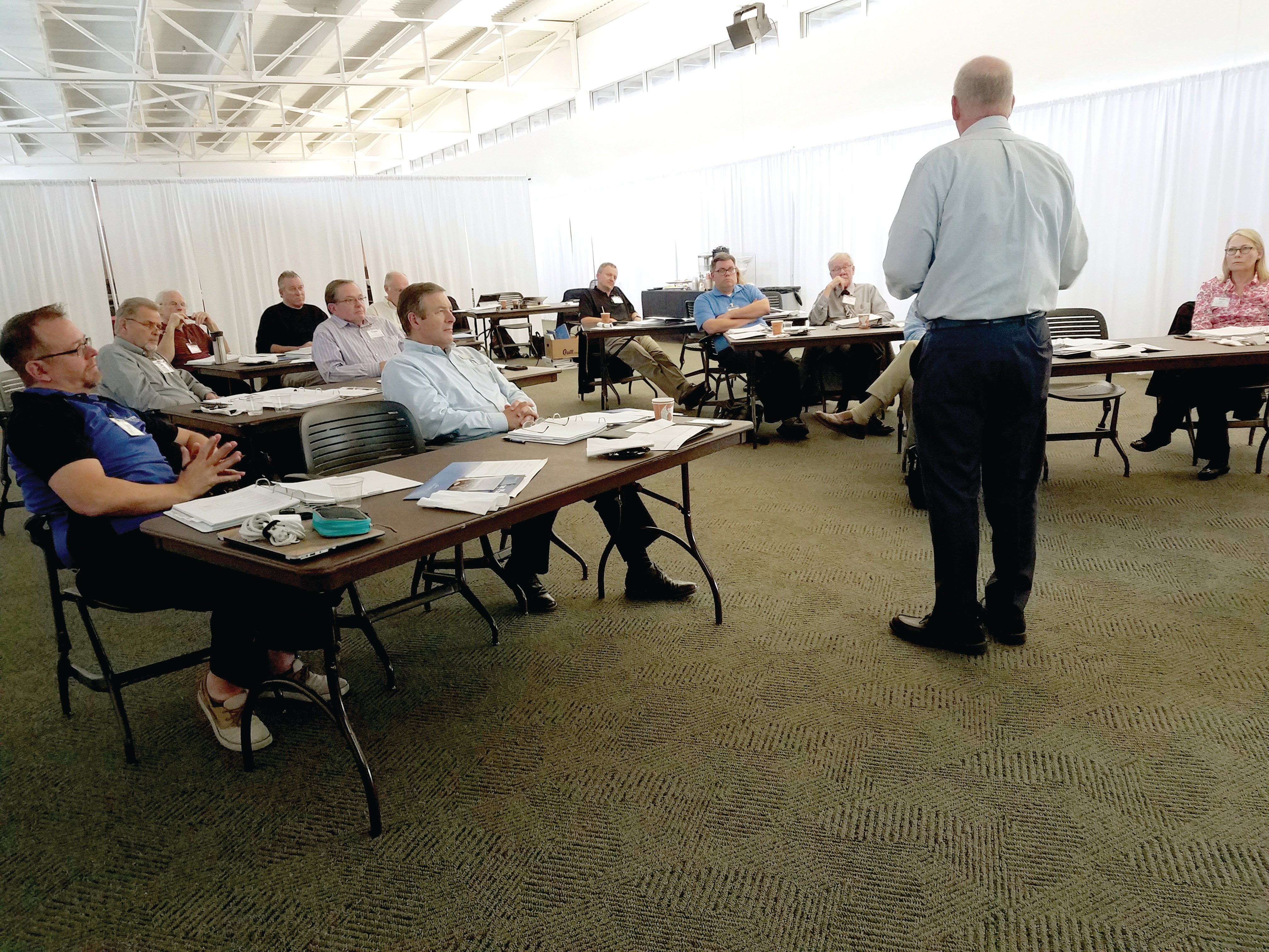 Rev. Phil Krupski presenting to class.